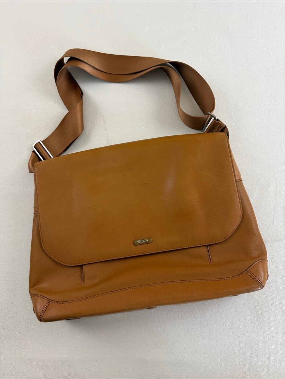 Tumi camel leather messenger bag